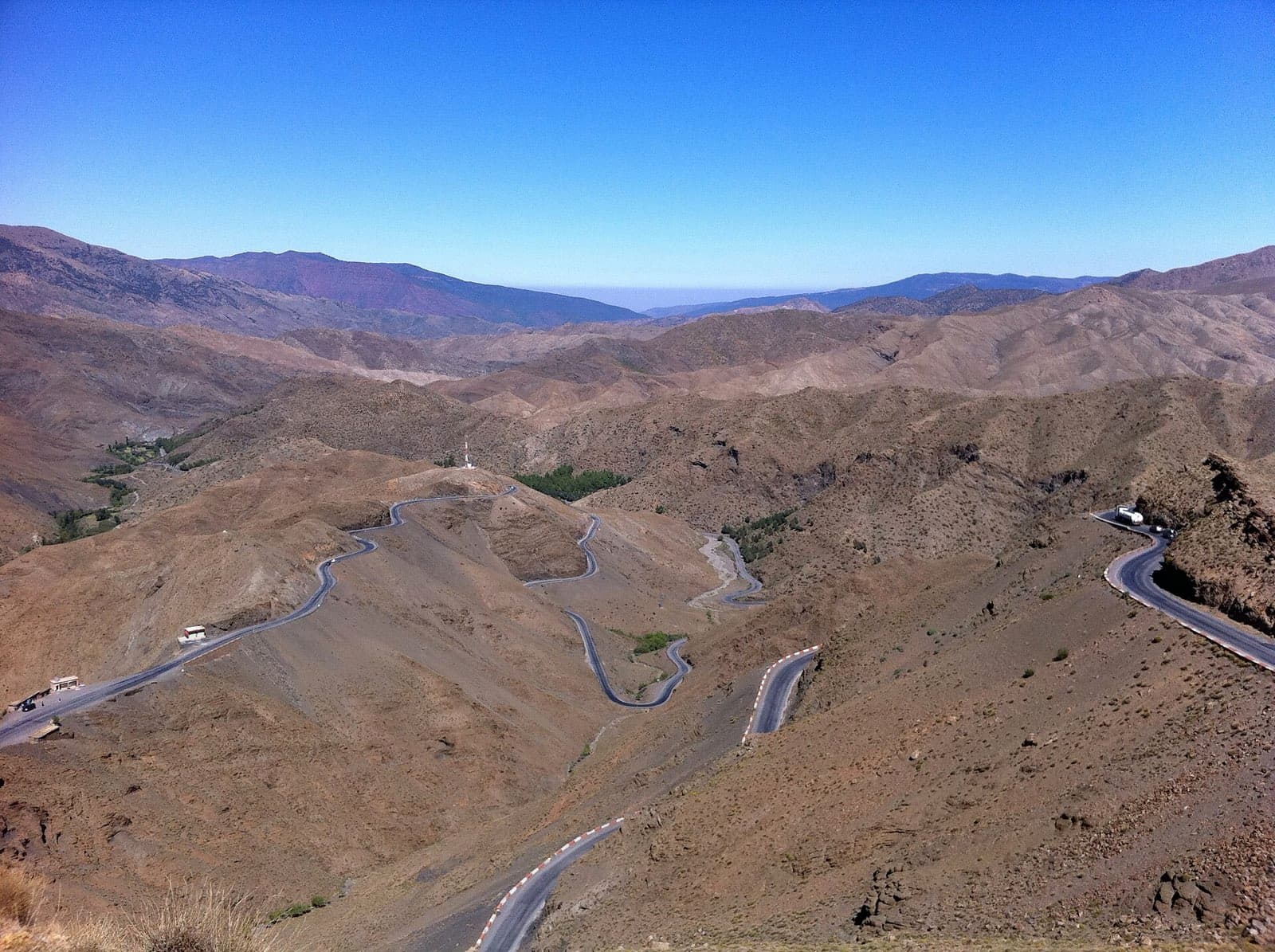 The N9 road winding in hairpins across bare mountainsides